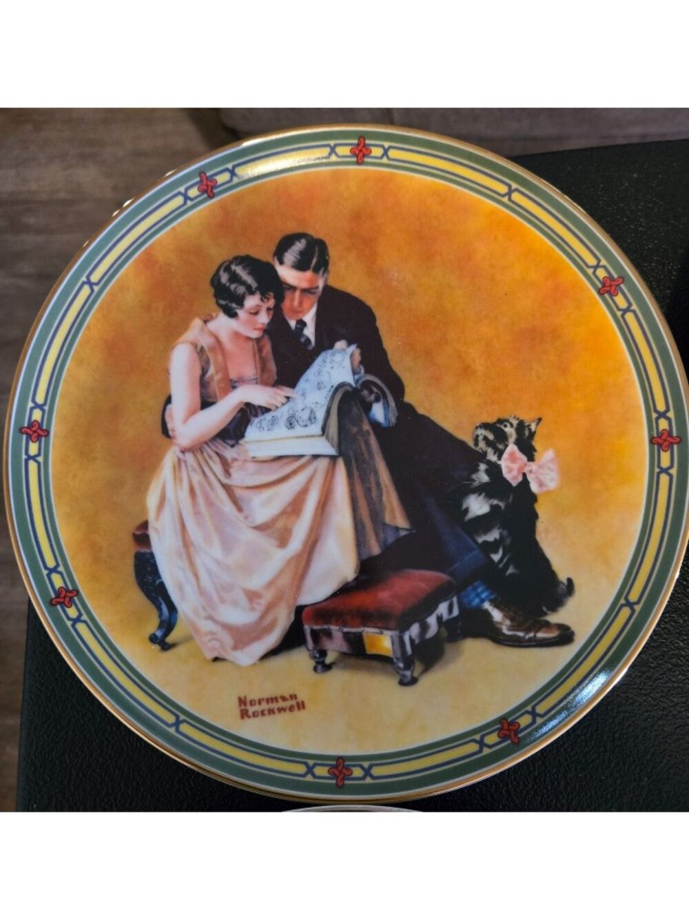 "A Couple's‎ Commitment" was painted by Norman Rockwell collector numbered plate